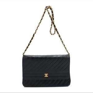 CHANEL Vintage CHANEL Diagonal Quilted Flap bag Entrupy
Authenticated